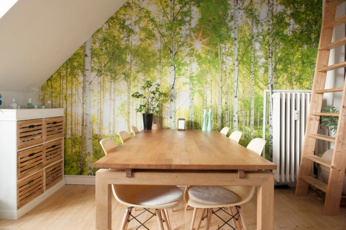 the walls in the dining room are covered with photowall-paper with the image of trees (birch)