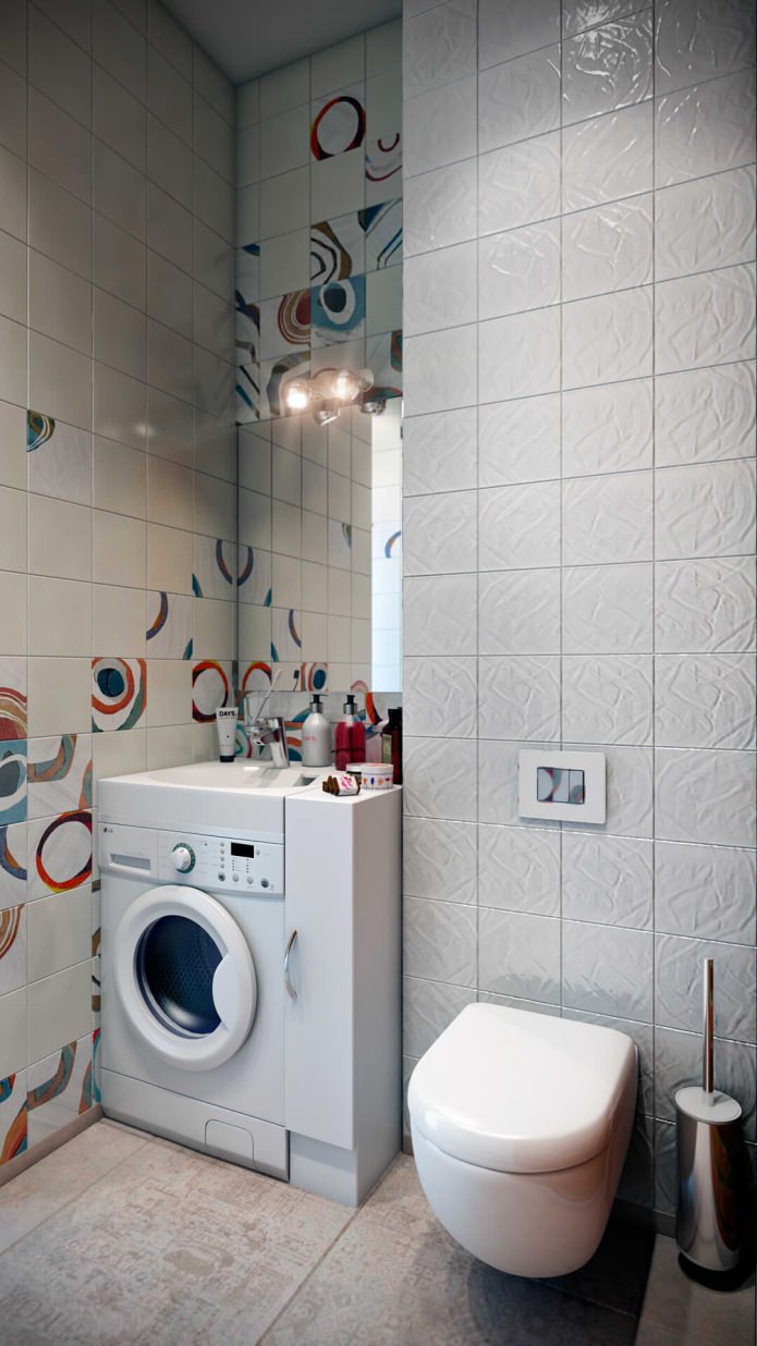 унутрашњост гостињског купатила са машином за прање веша