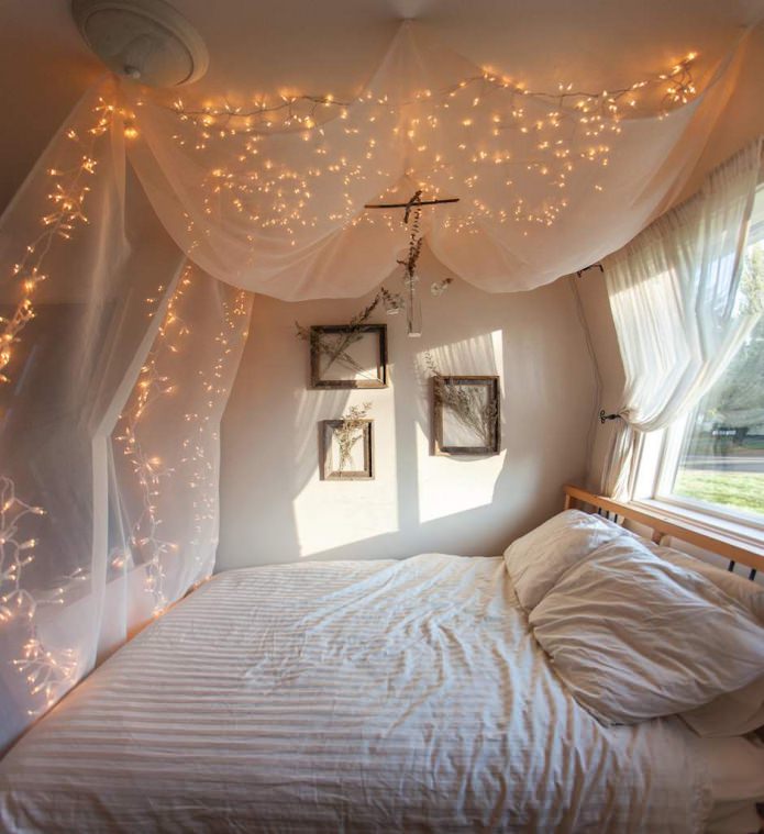 translucent fabric with a garland: bed curtain