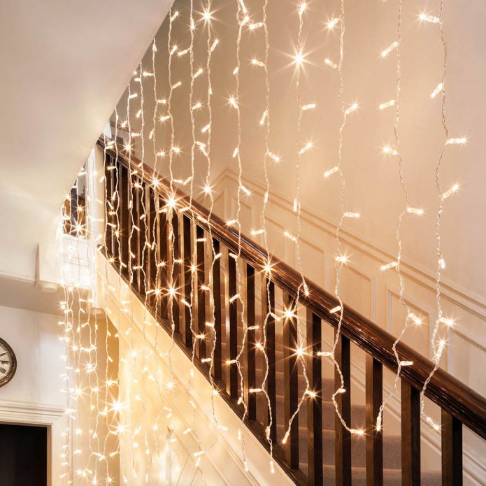 Decorating stairs with a garland