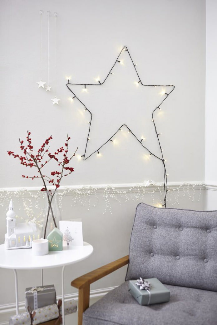 drawing on the wall in the form of a star using a garland