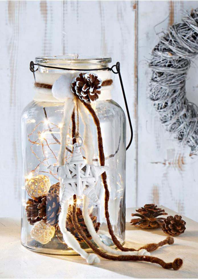 Decorating a glass jar with a garland