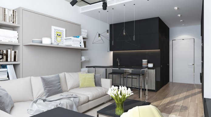 A stúdióapartman nappali modern kialakítása konyhával kombinálva
