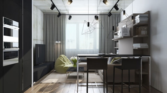 A stúdióapartman nappali modern kialakítása konyhával kombinálva
