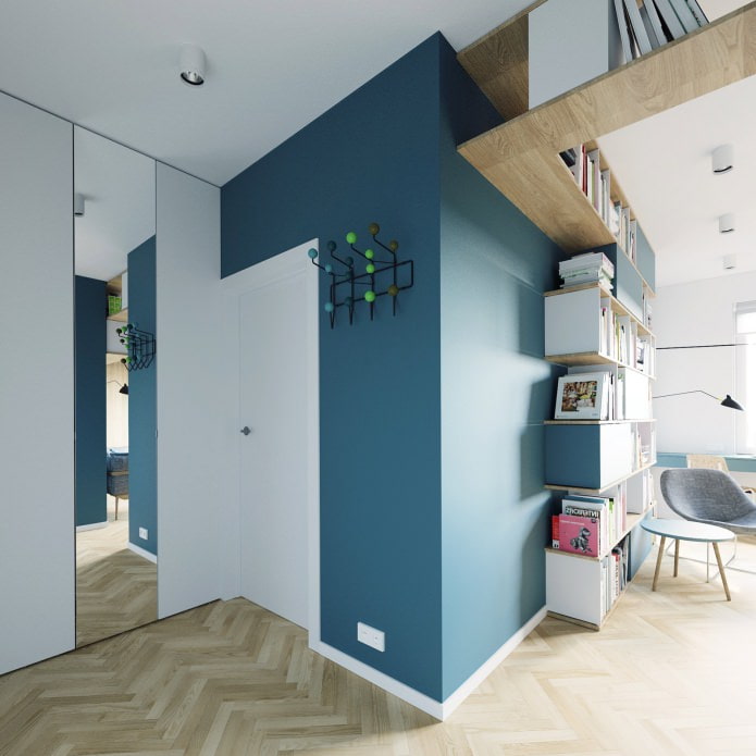 hallway design in white and turquoise colors in a studio apartment