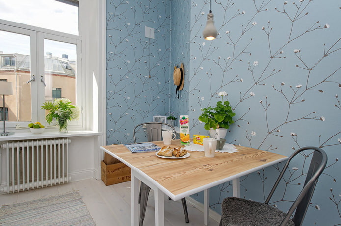 Scandinavian style kitchen with blue wallpaper