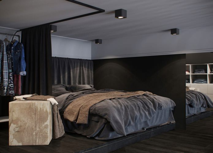 Schlafzimmereinrichtung in einem Studio-Apartment mit hohen Decken ceiling