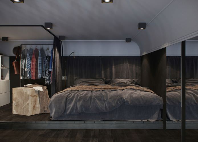 Schlafzimmereinrichtung in einem Studio-Apartment mit hohen Decken ceiling