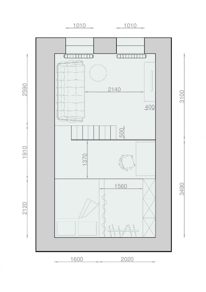 Layout of a two-level studio with high ceilings