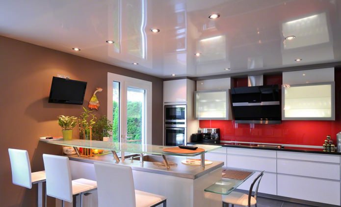 Glossy stretch ceiling in the kitchen