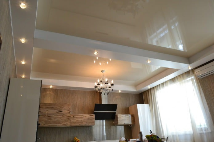 stretch ceiling with a chandelier in the kitchen