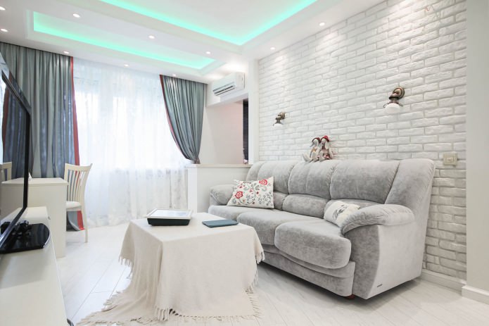 Wohnzimmer mit weißer Backsteintapete