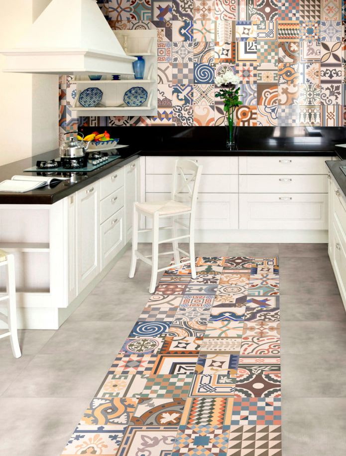 Patchwork tiles on the kitchen floor and apron