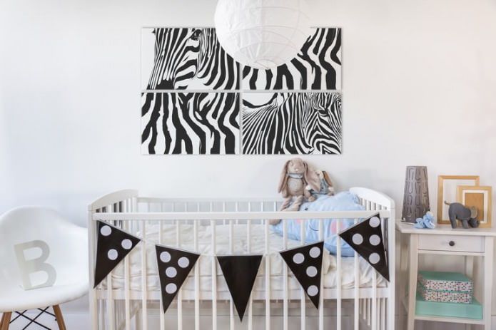 Modular picture in the interior of a nursery for a newborn