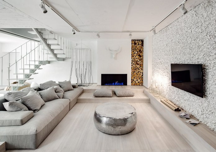 fireplace in the interior of the living room in an eco-style