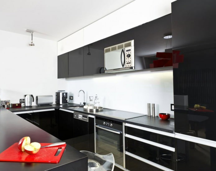 black and white kitchen interior with the addition of red