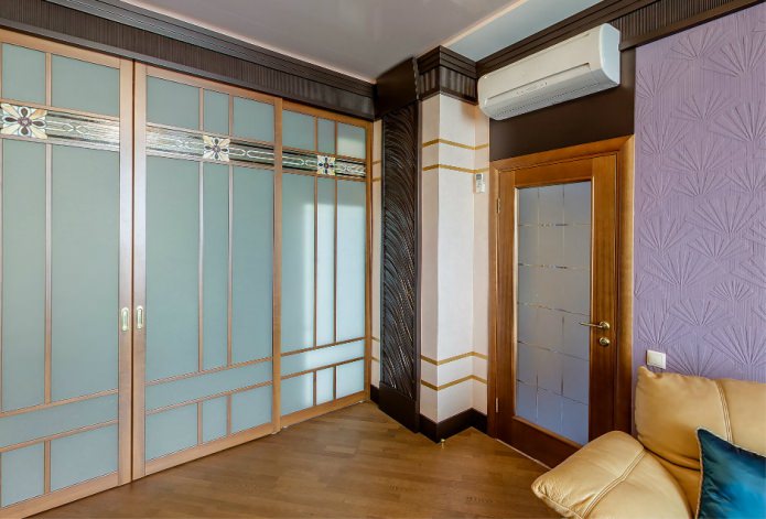 wooden interior door with glass inserts in the interior