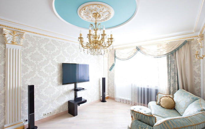 White wallpaper in the interior of the living room in a classic style