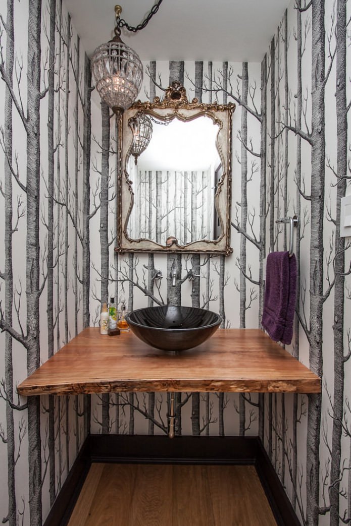 wallpaper with trees in the bathroom interior