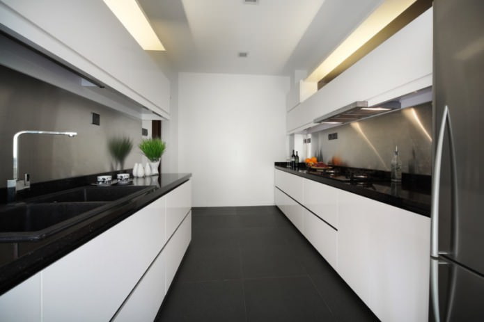 black countertop in a parallel kitchen