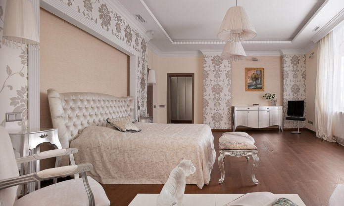Beige walls with wallpaper and painting in the bedroom