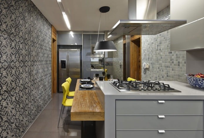 Gray wallpaper with a pattern in the interior of a modern kitchen
