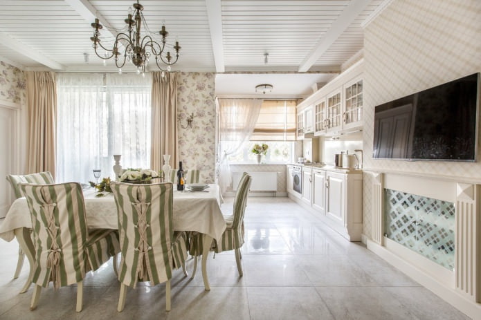 Kitchen-dining room design with beige wallpaper
