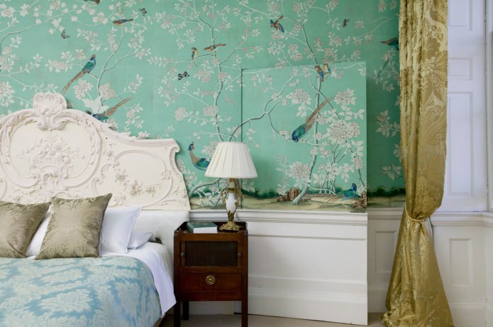 Green walls in the bedroom with wallpaper