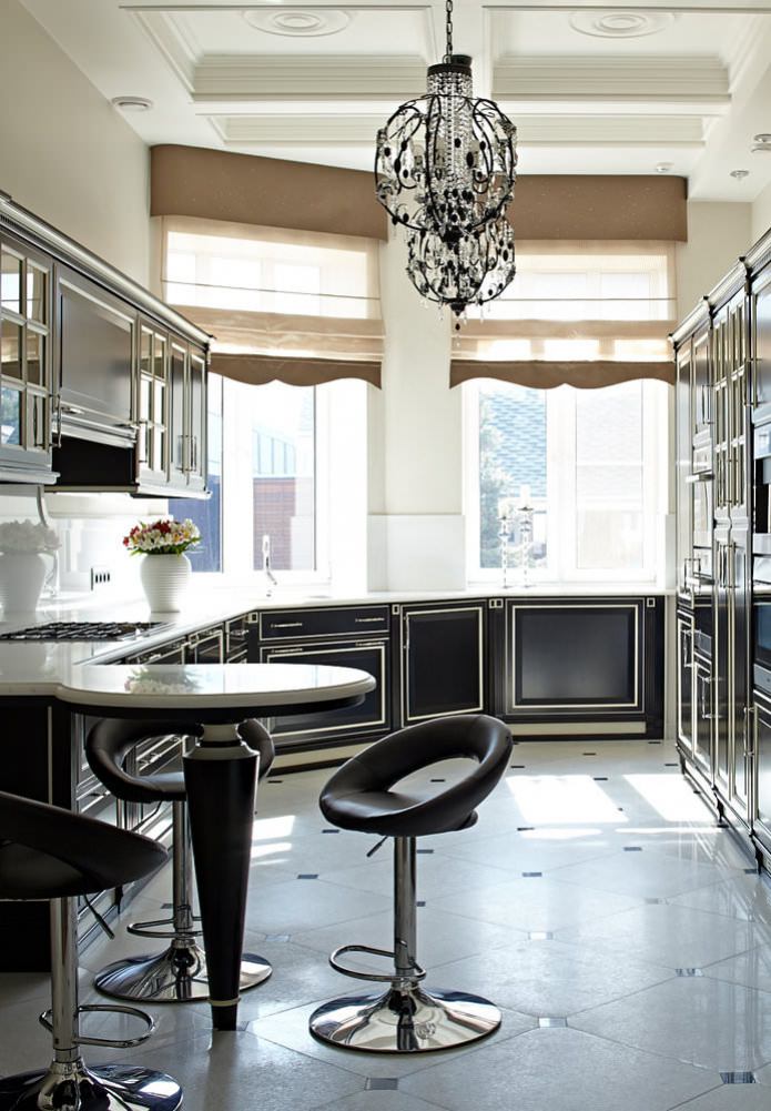 kitchen with a black suite and light walls