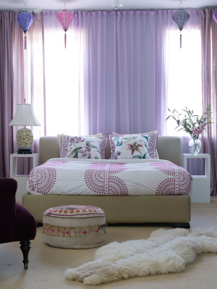 lilac curtains in the interior of the bedroom