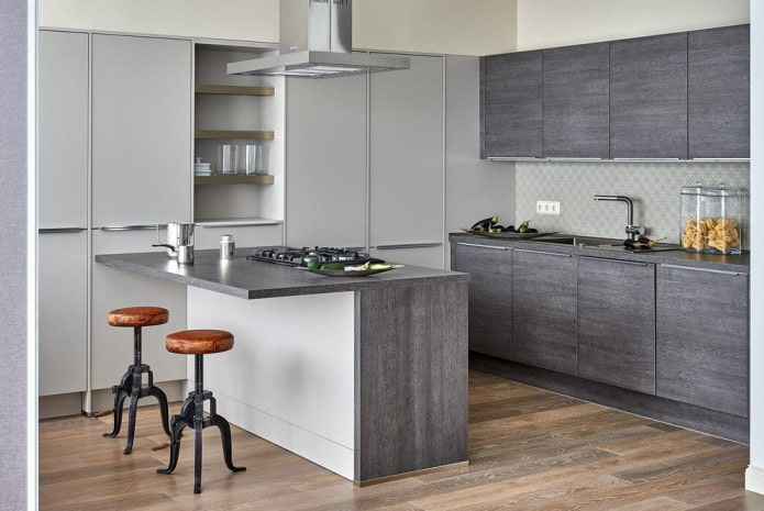 Light gray kitchen with dark countertop