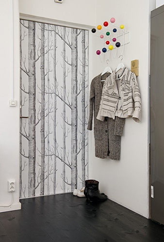 self-adhesive door decoration with a pattern of trees