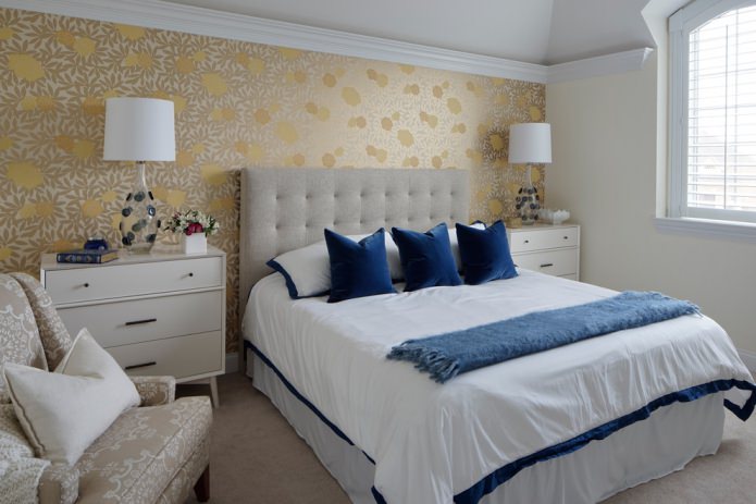 bedroom in light colors with blue accents