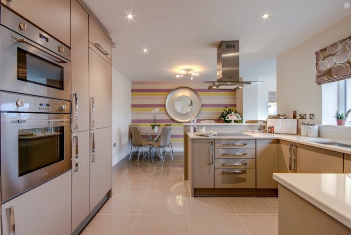 bright striped wallpaper in the kitchen with a beige set