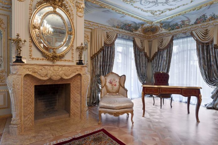 frescoes, mirror in a gold frame, fireplace with stucco