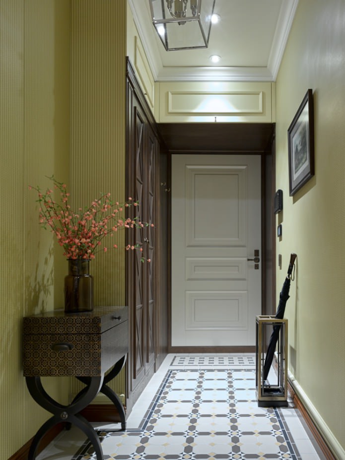classic style in the hallway with green wallpaper
