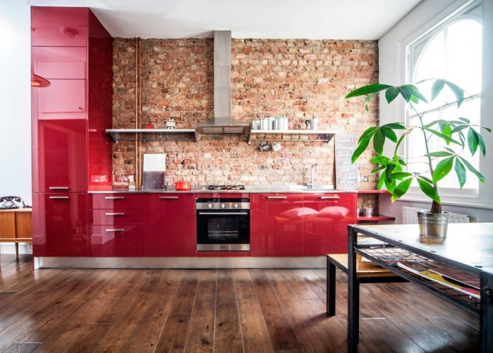 Red brick in the kitchen with red facades