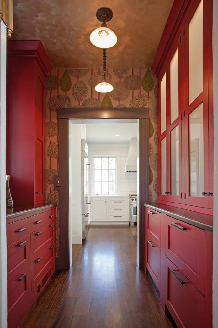 wallpaper in the kitchen with a red set