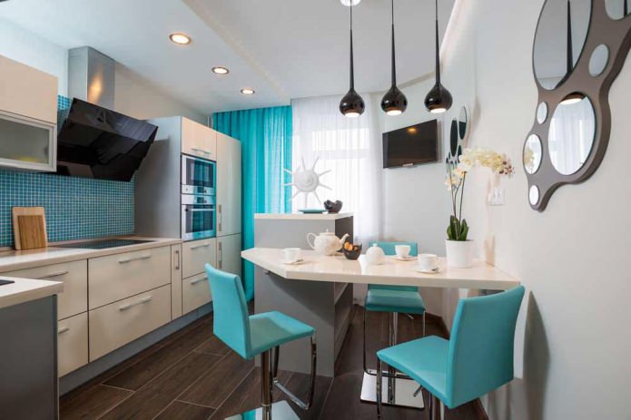 kitchen with white set and white and turquoise curtains