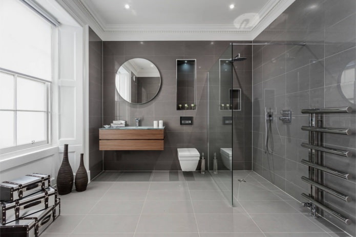 fürdőszoba belső modern stílusban, szürke téglalap alakú csempékkel