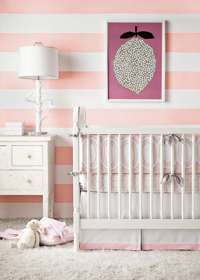 Pink striped wallpaper in the nursery