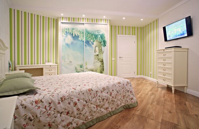green striped wallpaper in the bedroom