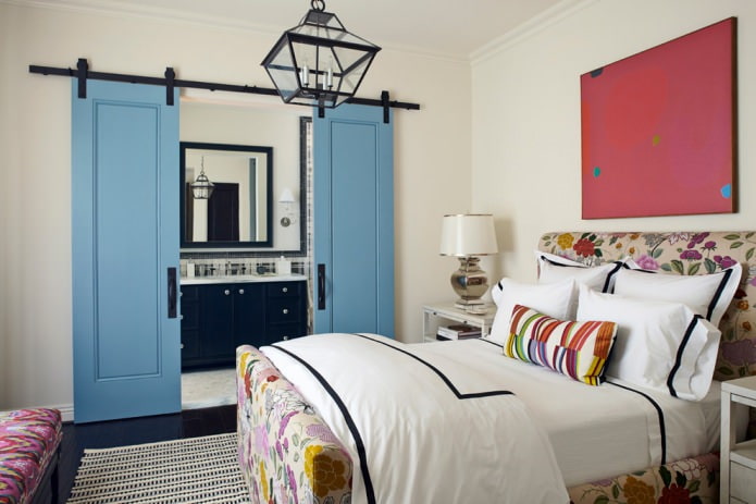 combination of blue doors and dark flooring