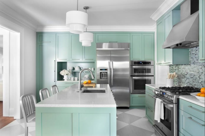 interior of modern island kitchen in mint colors