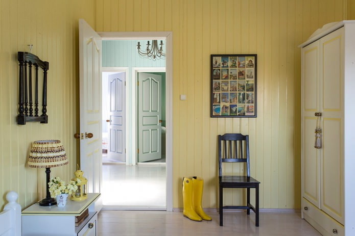 pale yellow painted wood paneling