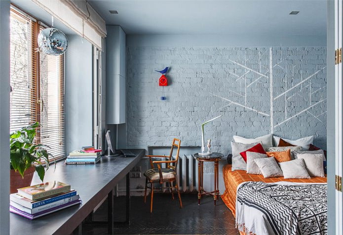bedroom with painted brick wall