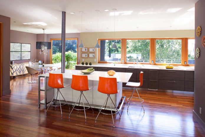 orange chairs in the kitchen