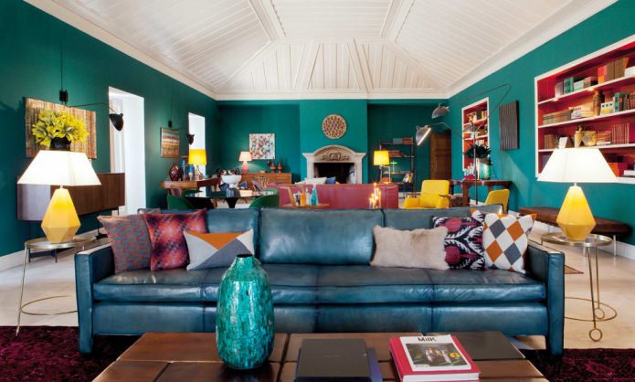 living room with a mansard roof in turquoise colors