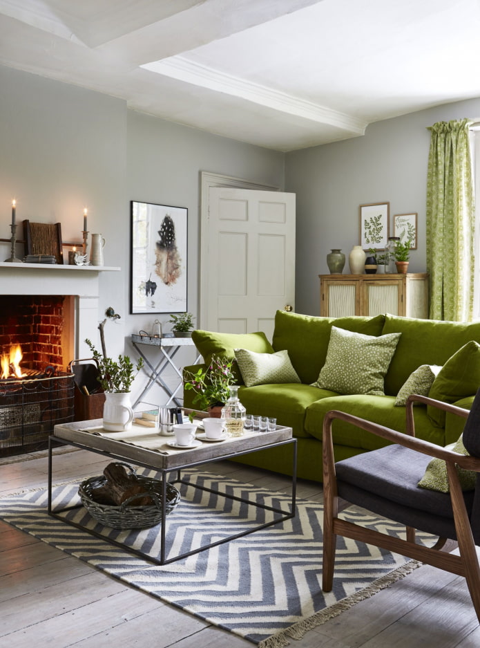living room with green sofa