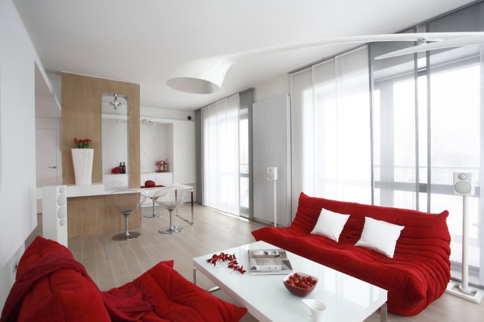 light walls and a red fabric sofa